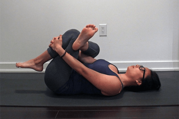 joining hands behind back yoga